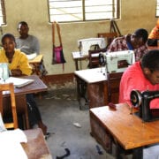 Travel Medicine - Father Pat’s school for the disabled – students learning to sew.